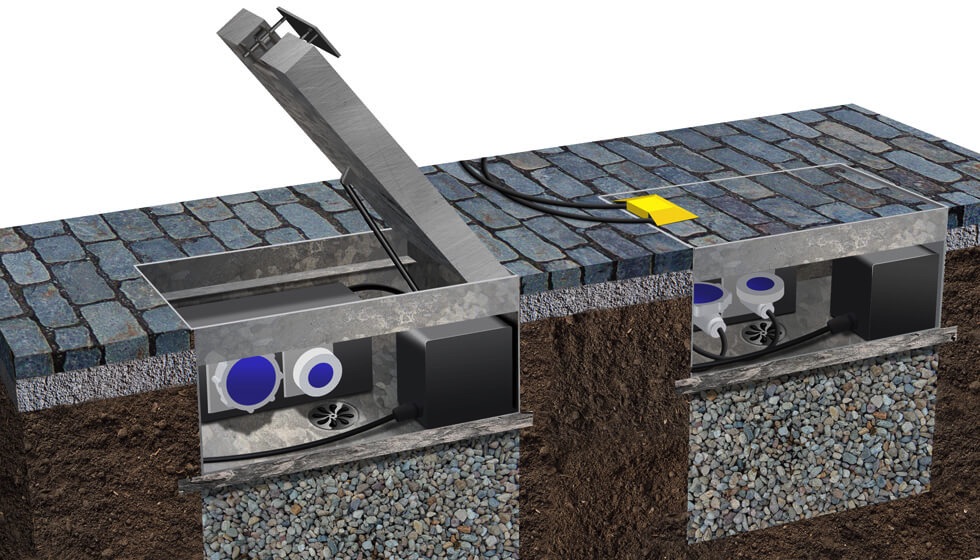 The principle of the in-ground service unit is clear to see in this diagram showing how the power sockets and other service points are neatly contained and submerged.